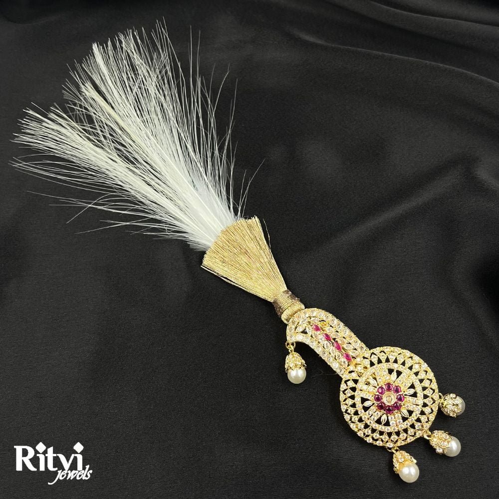 Ritvi-Kunal-Gold-Finished-Pearl-AD-Kalgi-1-1.jpg Ritvi Kunal Gold Finished Pearl AD Kalgi - Image 1